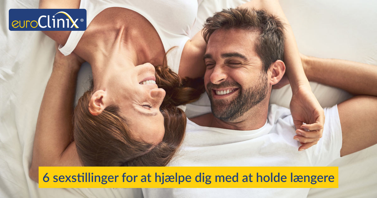 Mand og kvinde glad liggende på en seng.