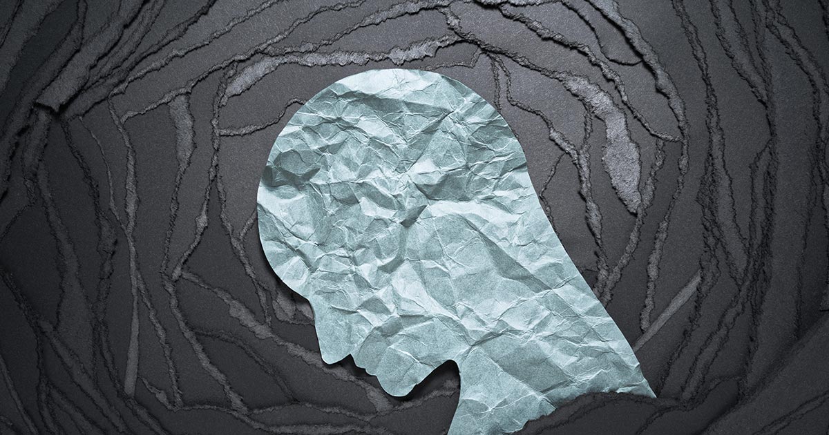 Silhuet af en figur, der lider af depression